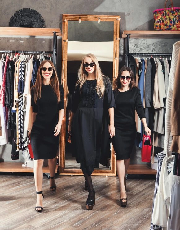 three-pretty-girls-go-shopping-fashion-luxury-shop-black-friday-concept